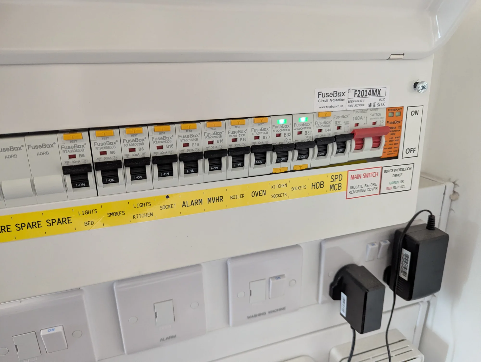 Close up of a finished consumer unit with labelled circuits
