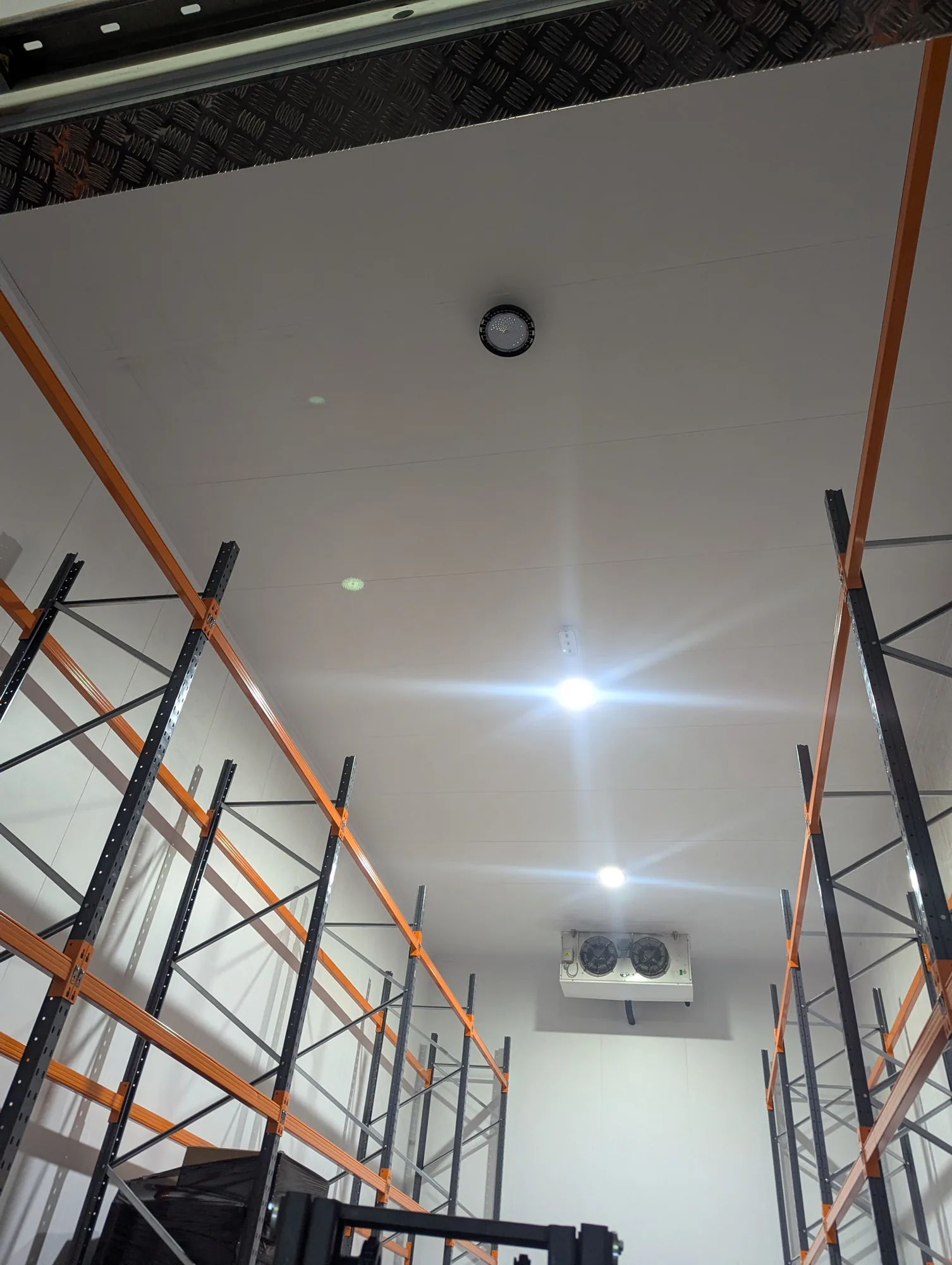 High bay lighting installed over warehouse racking in Bexley