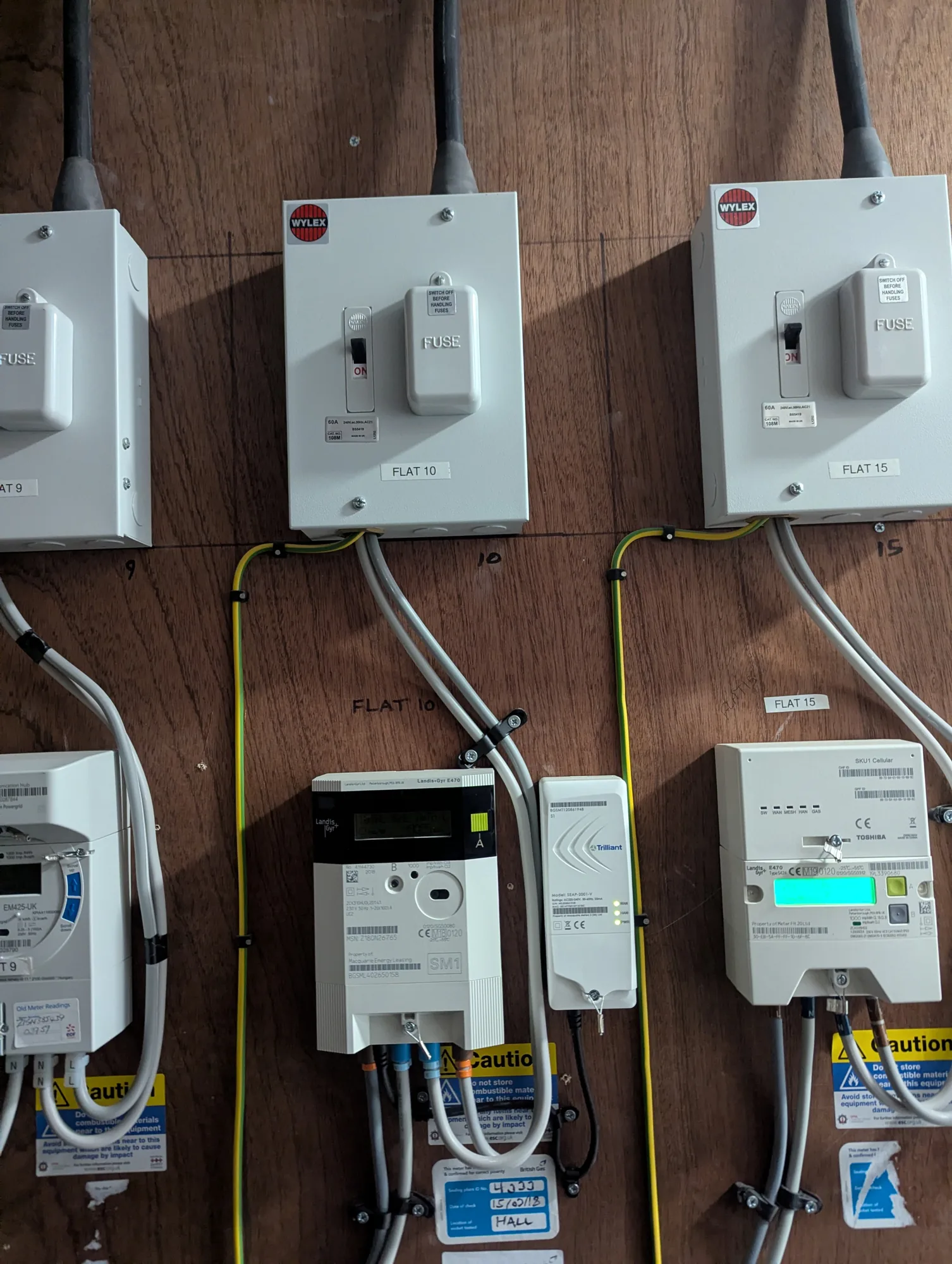 Service-head fuse switches and meters in a block of flats